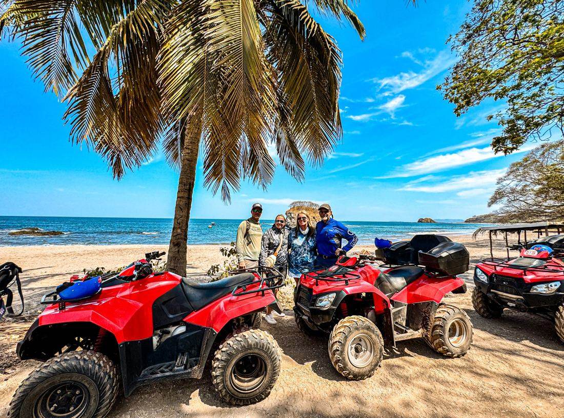 Guests with ATV quads parked on a Punta Cana beach