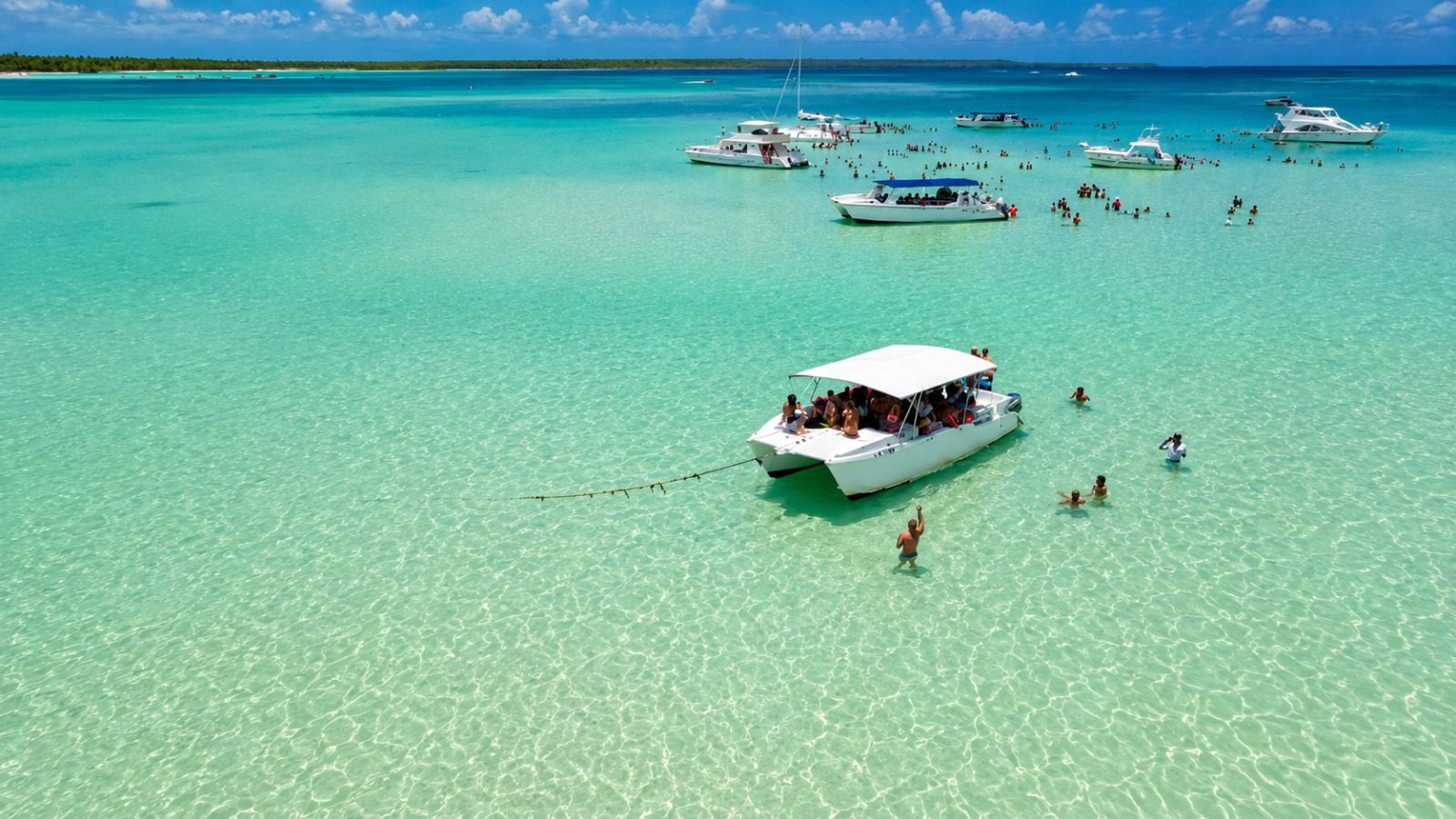 Aerial view of Smile Adventure Tour boat in the crystal-clear waters of Punta Cana
